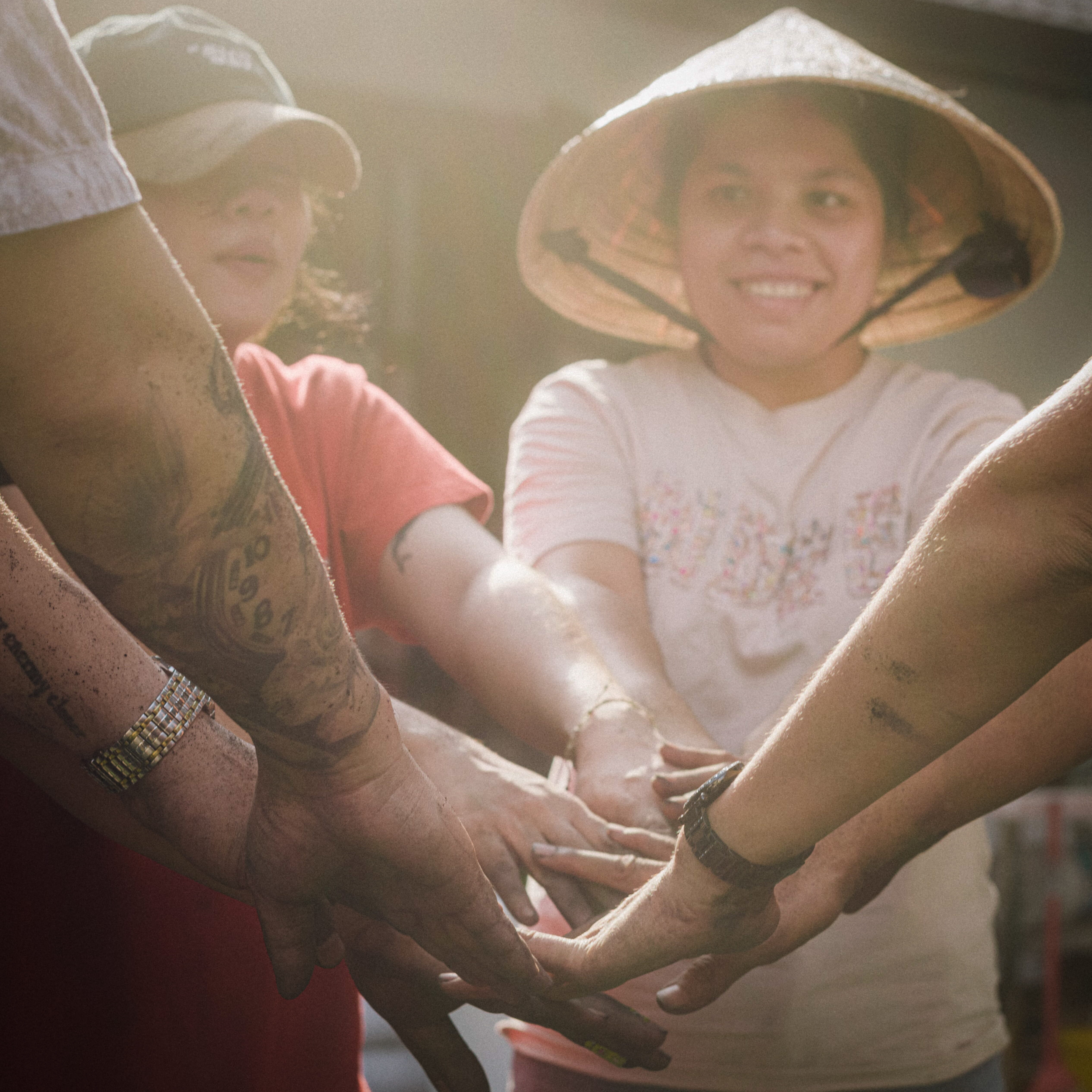 Hands joined together symbolizing community and teamwork