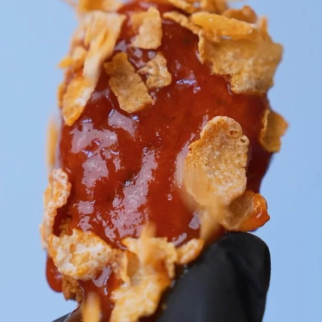 Cereal-crusted saucy wing