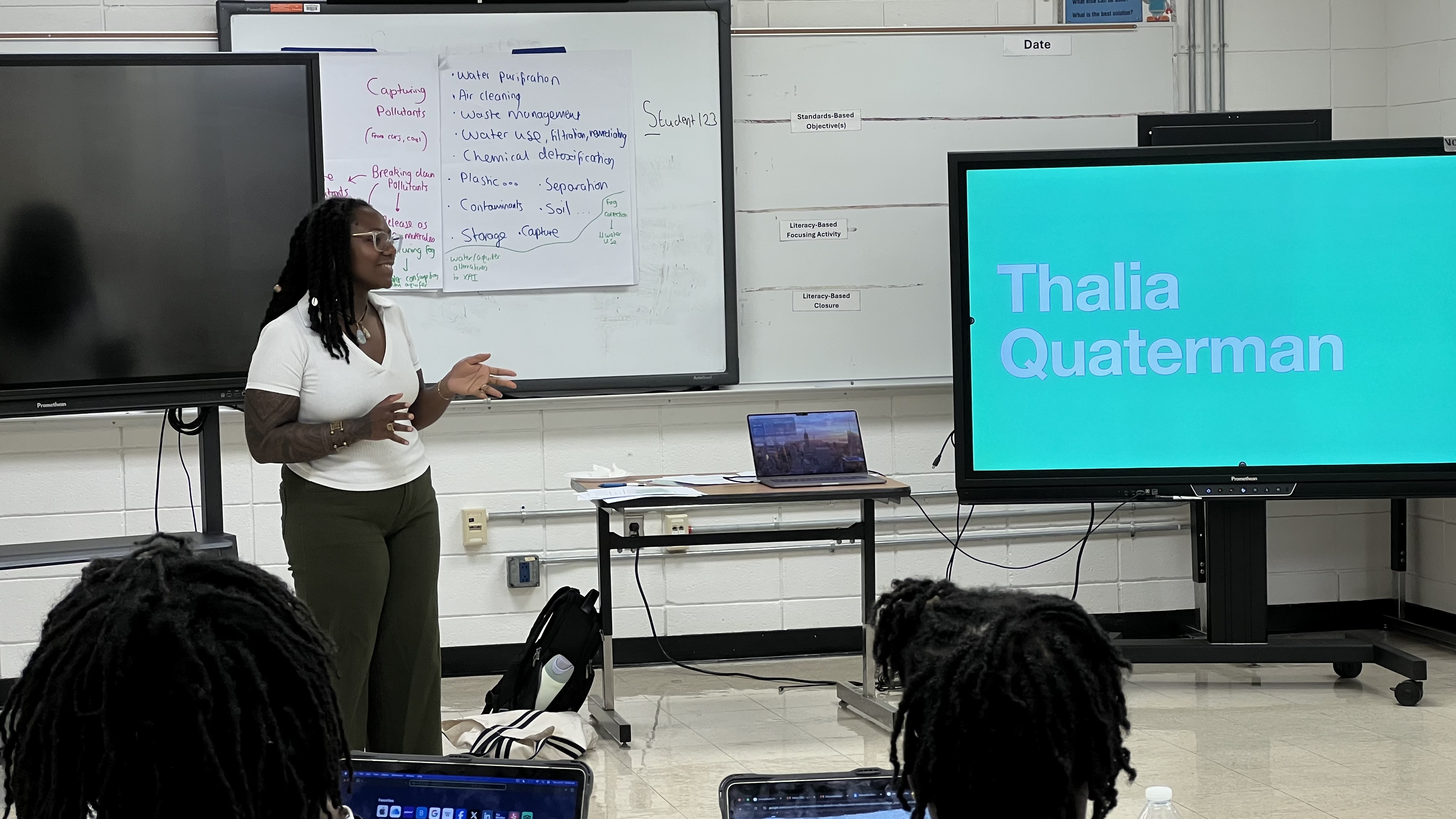 Environmental researcher Thalia Quaterman giving a talk to young scientists