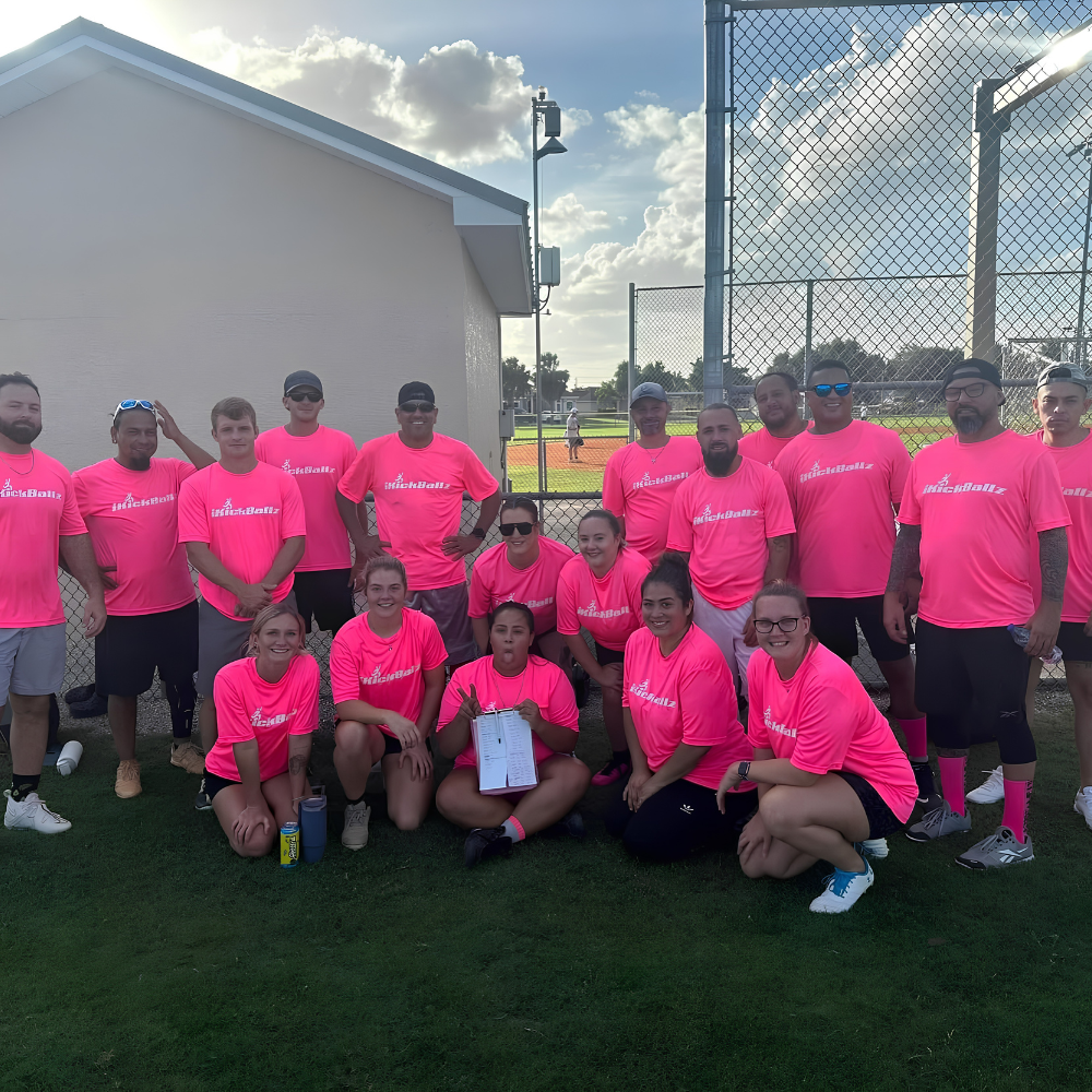 bright pink team together on the field