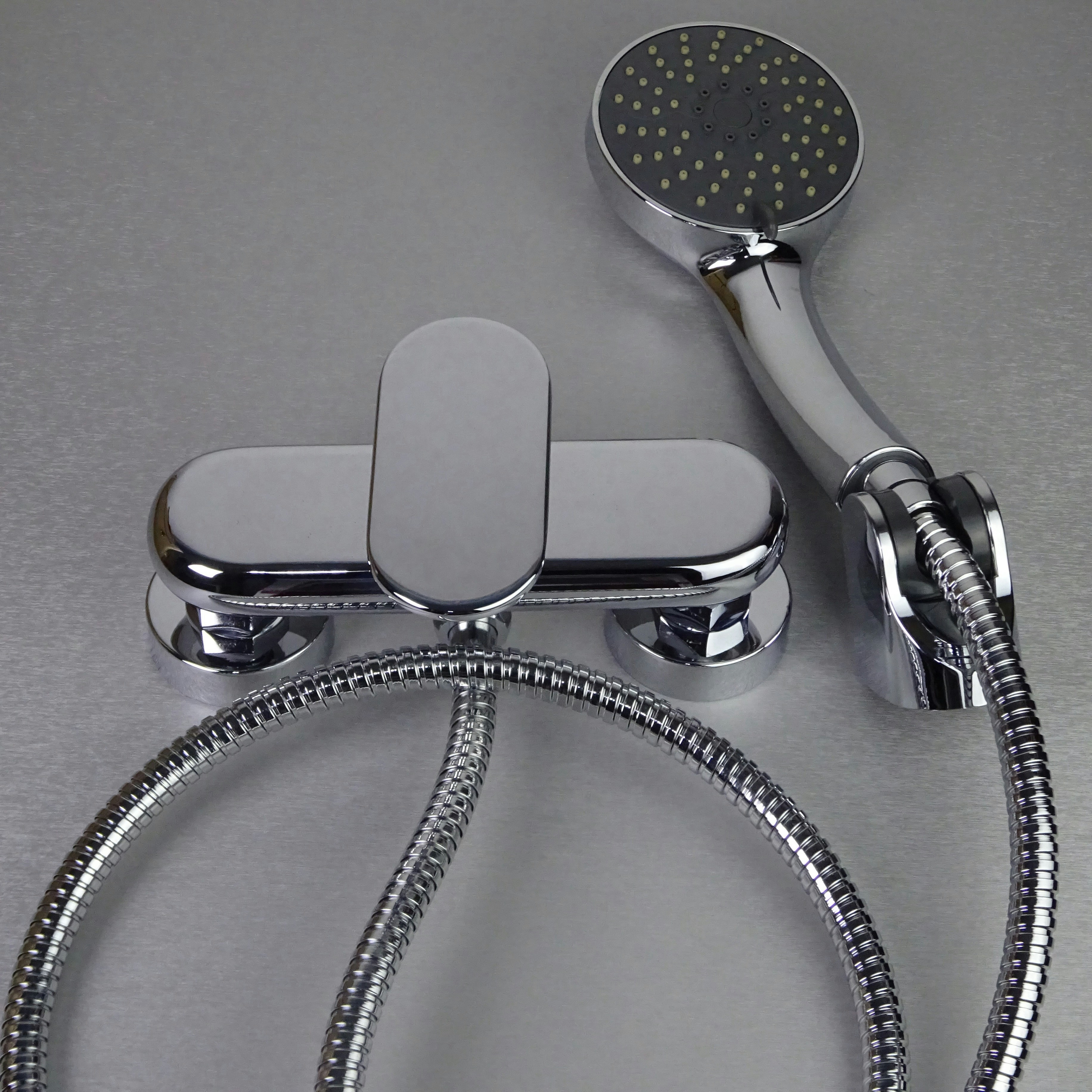 Modern bathroom faucet being professionally installed.