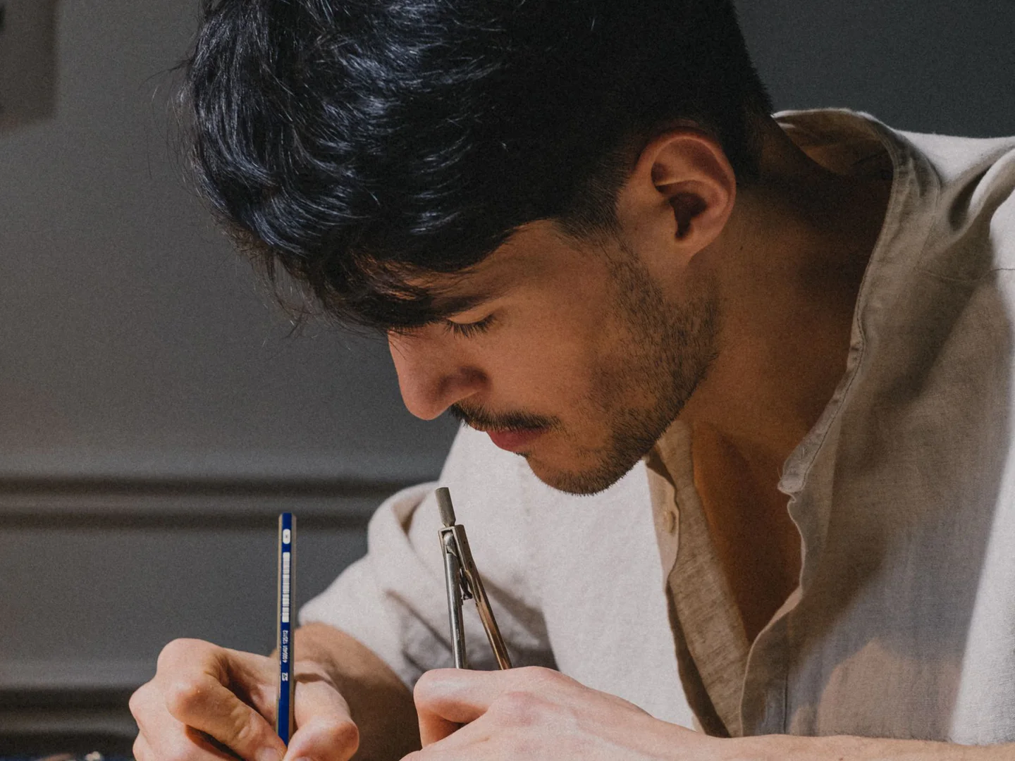 Architect refining a physical building model