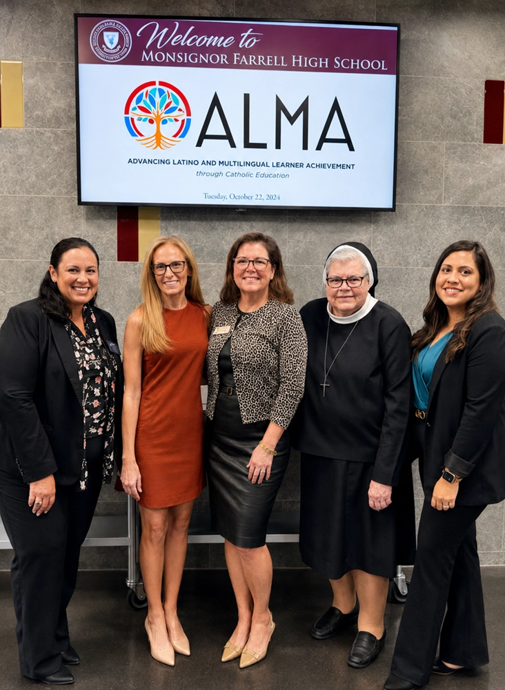 Kristin Moore with four Catholic educators, including a religious sister, at the ALMA conference on Latino and multilingual learner achievement.