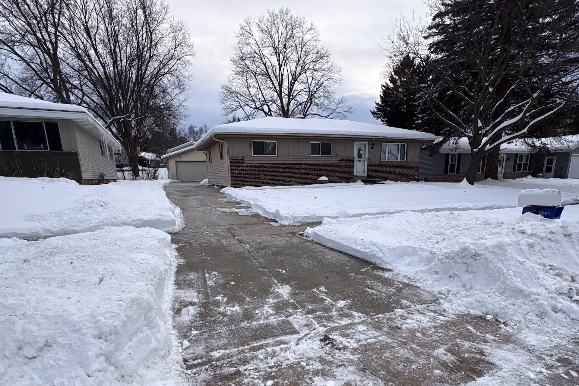 Snow plowing and ice management for Wisconsin residential properties