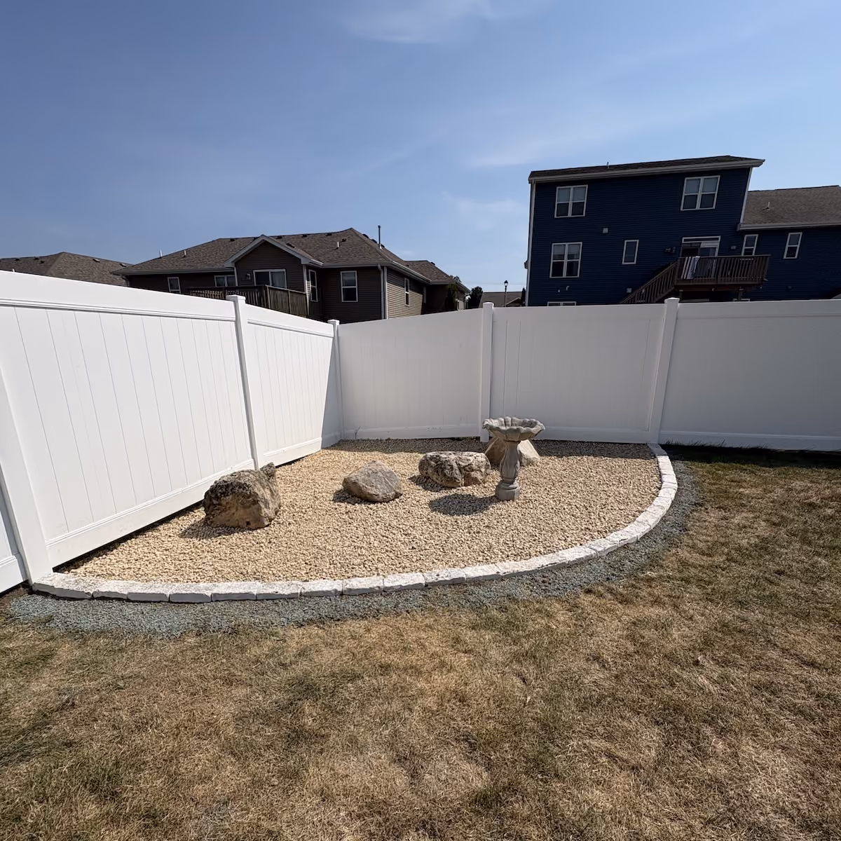 Decorative rock landscape bed installed by Donath Landscaping Solutions LLC