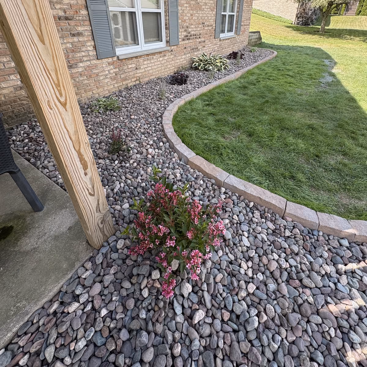 Decorative rock landscape bed installed by Donath Landscaping Solutions LLC