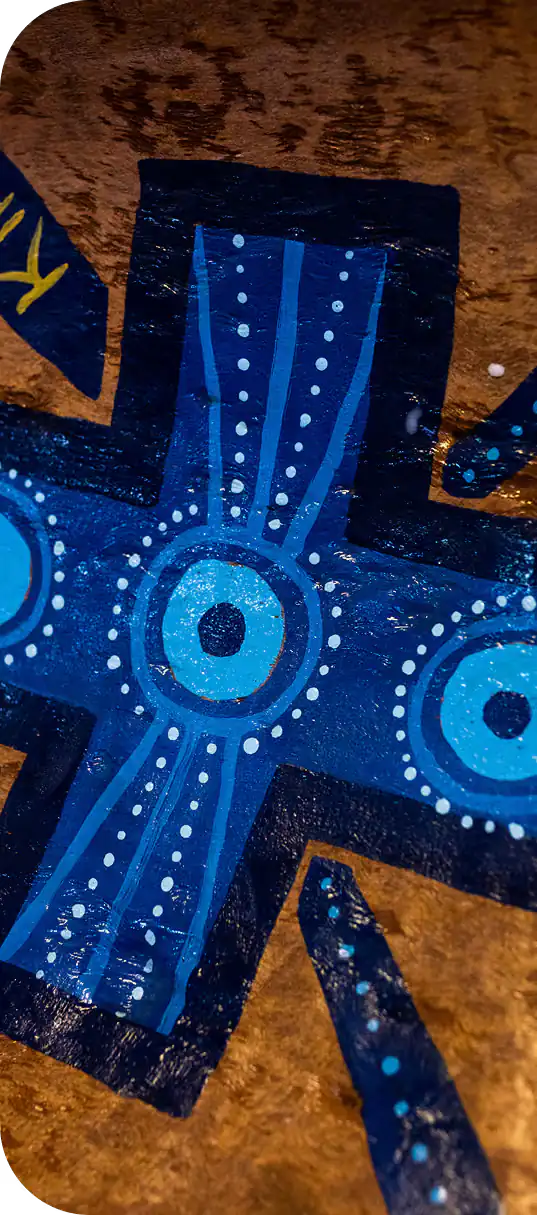 Painted blue cross artwork