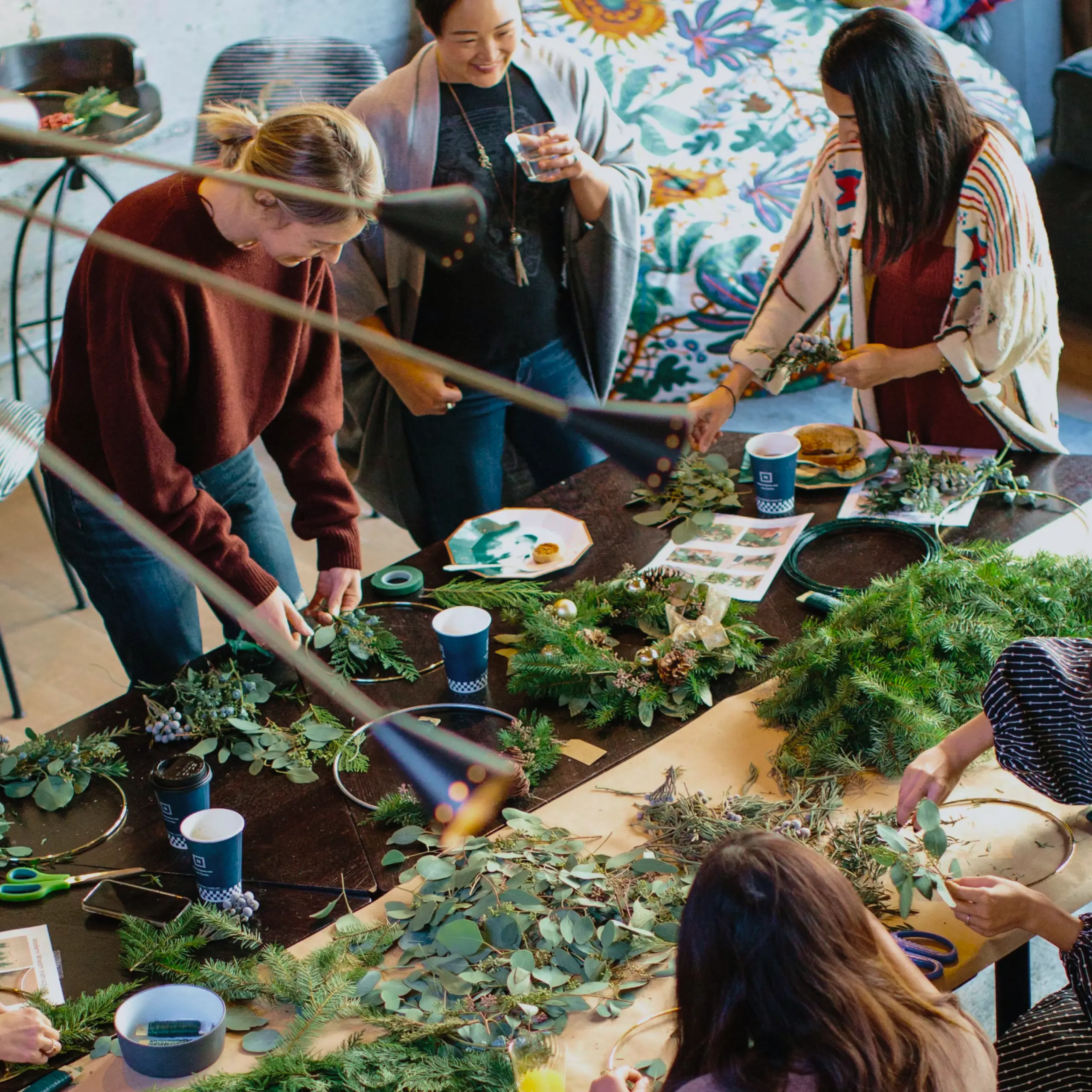People participating a public wreath making workshop