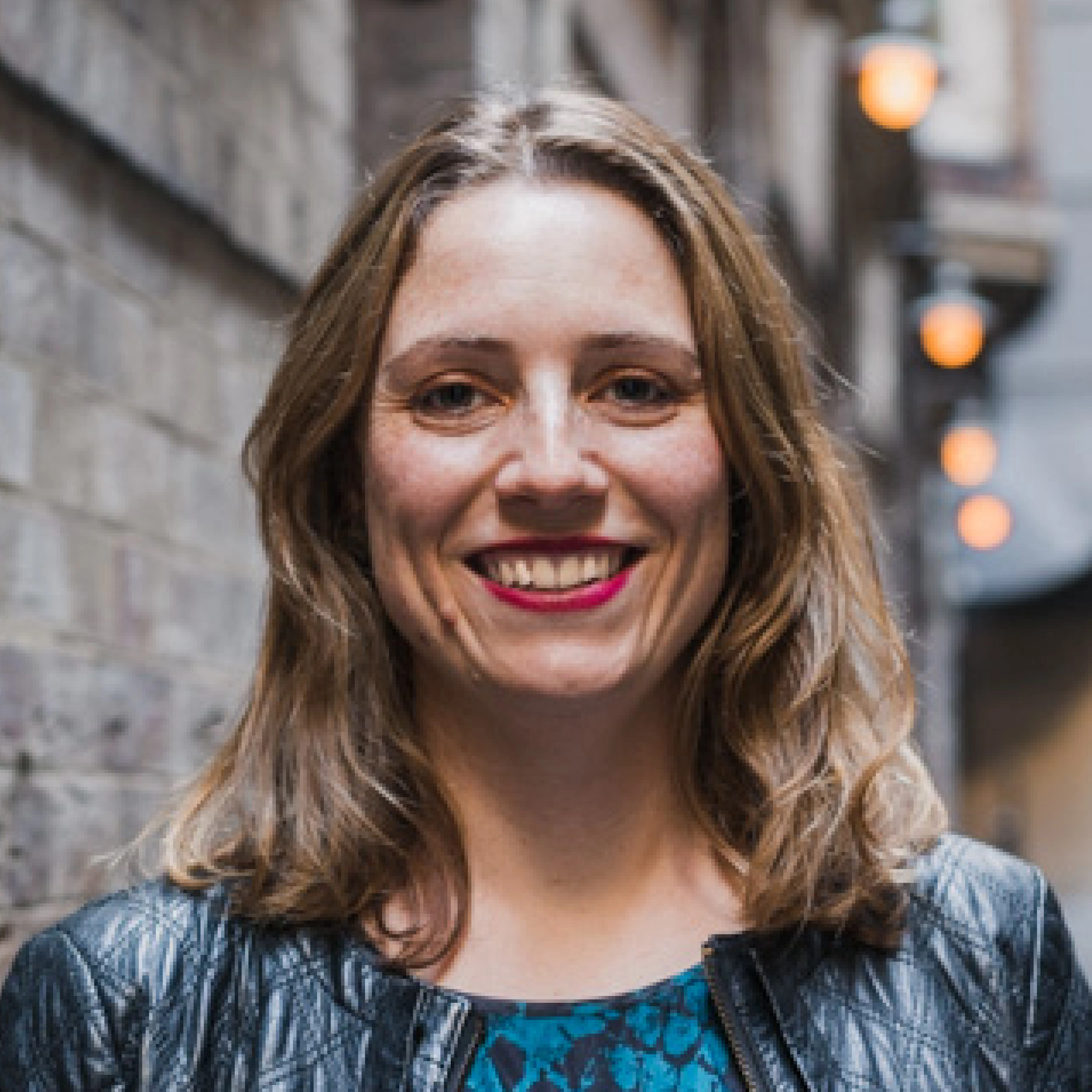 A profile photo of Ella Taylor, the Head of Design