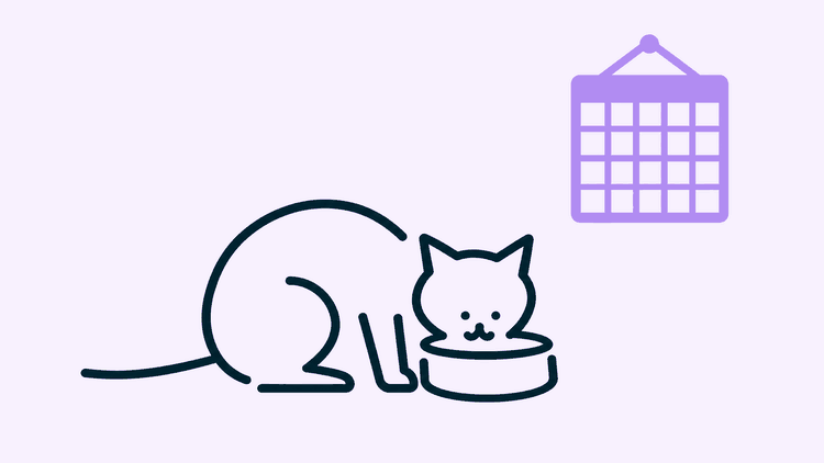 A cat drinks from a water bowl on a kitchen floor below a wall calendar.