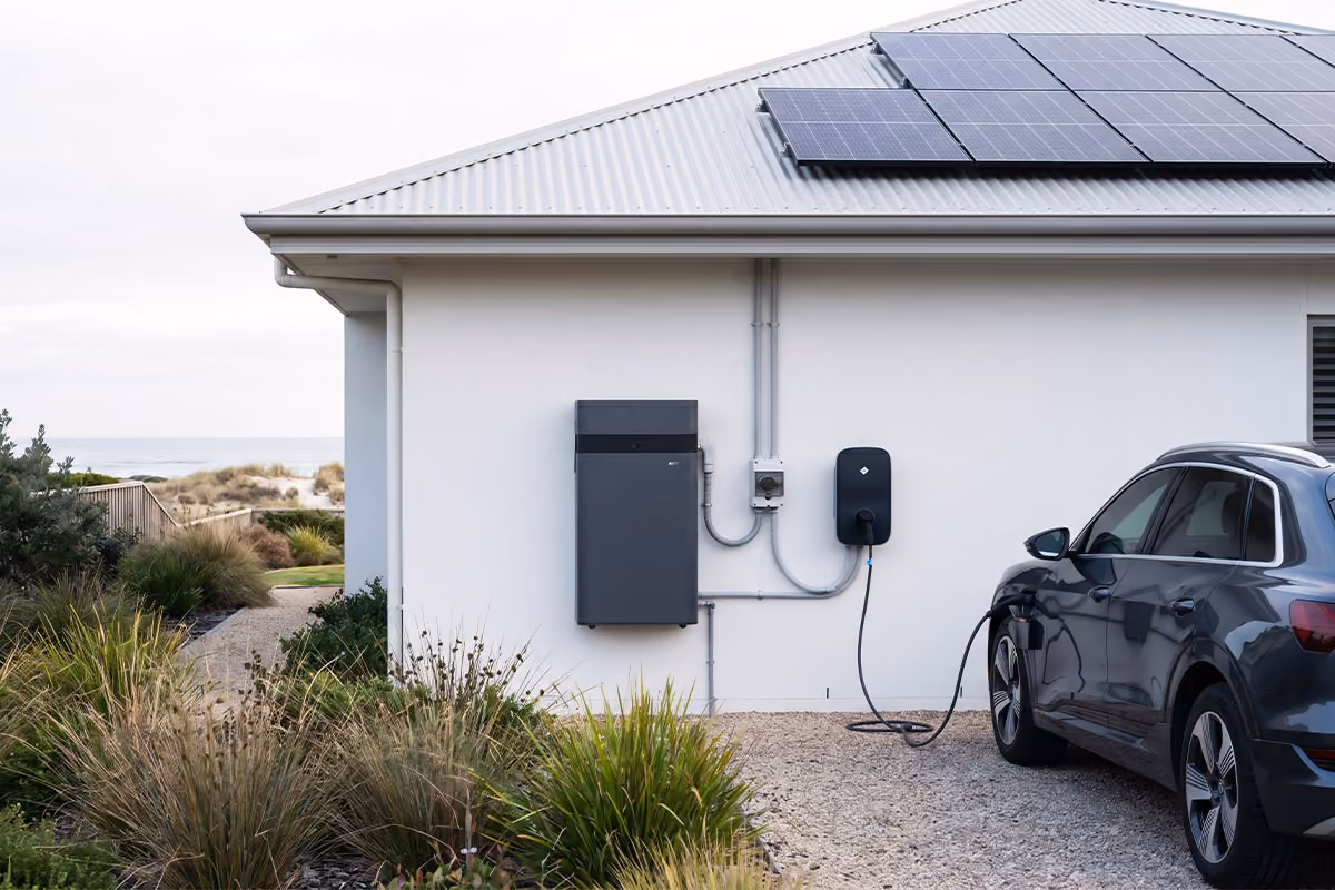 House with solar panels and ev charger