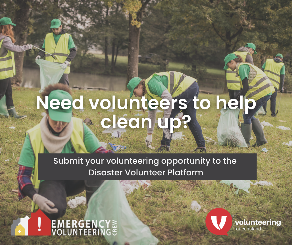 Volunteers clearing a backyard after a disaster