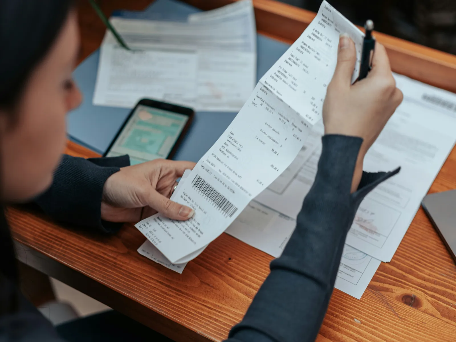 Customer reviewing household bills