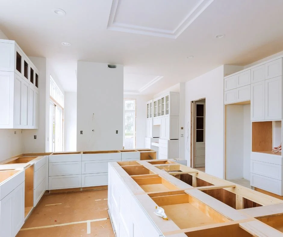 High-end kitchen remodel in Vacaville California with custom cabinetry quartz countertops and large island designed for everyday living