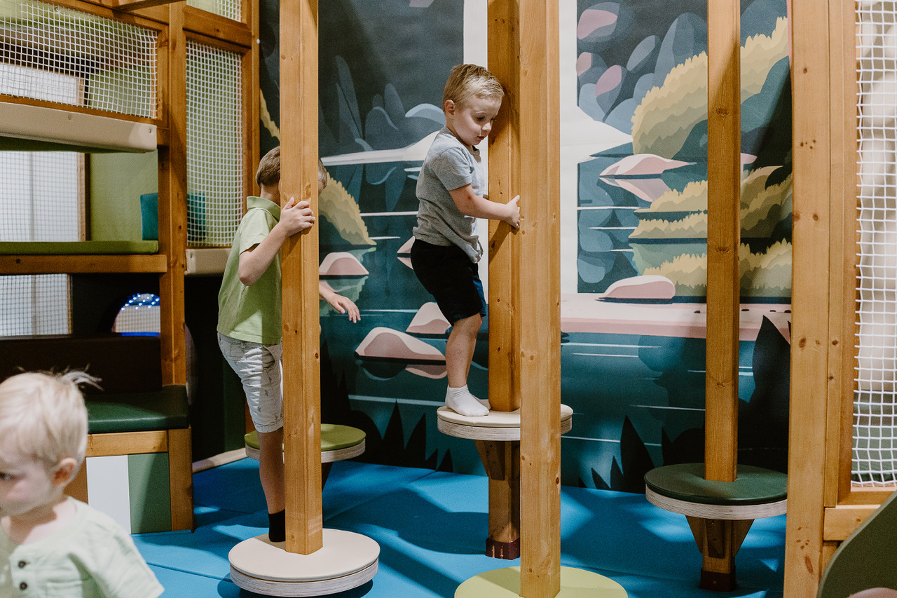 Kids climbing at Playful Pines