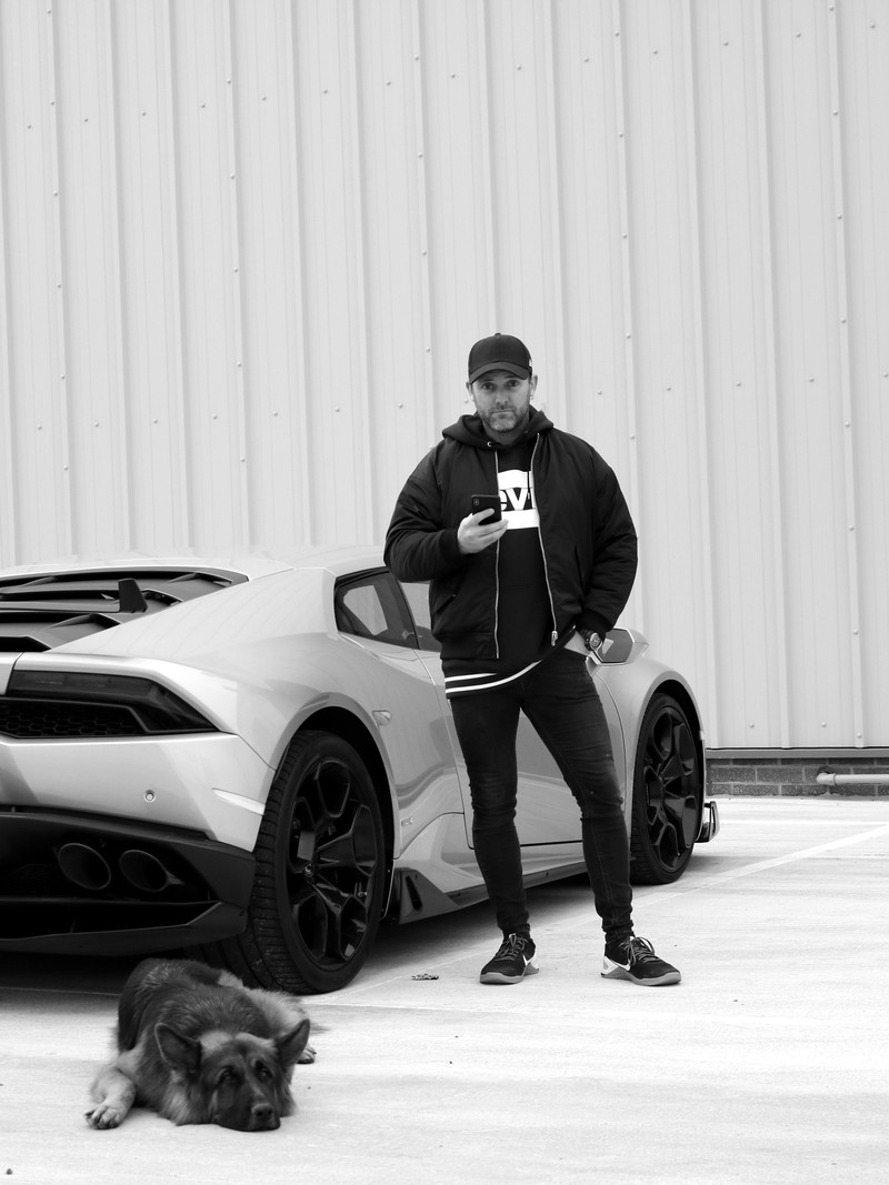 Scott McKay with his Lamborghini and German Shepherd during the £4m years