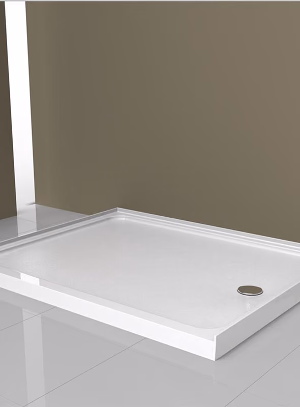 White rectangular shower base tray with drain hole installed on a tiled floor.