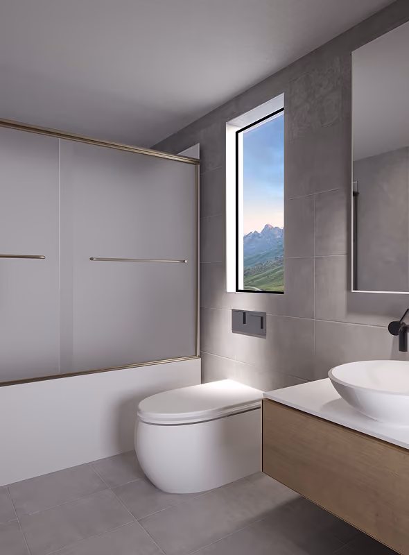 Modern bathroom with a white toilet, glass shower door, wall tiles, a window with mountain view, and a sink.