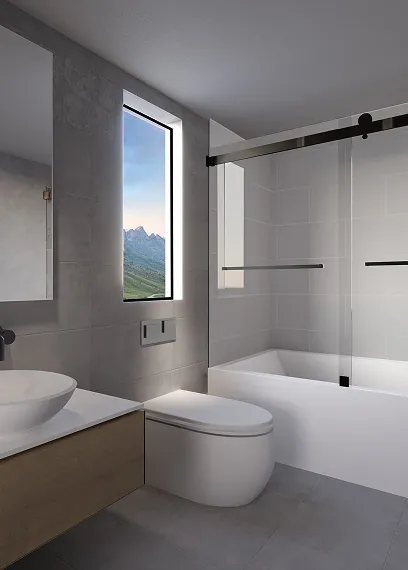 Modern bathroom with a toilet, vessel sink, wooden cabinet, and tub with sliding glass doors.