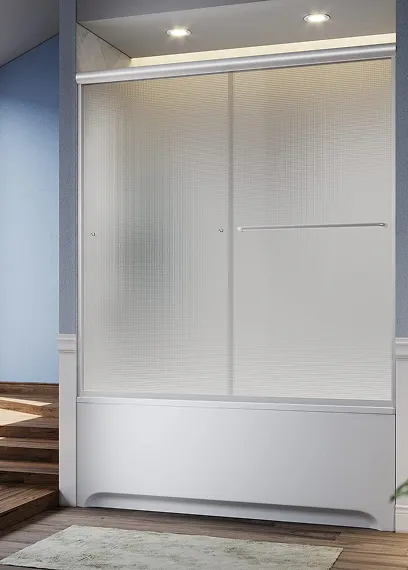 Modern bathroom with white bathtub and frosted glass sliding shower doors under ceiling lights.