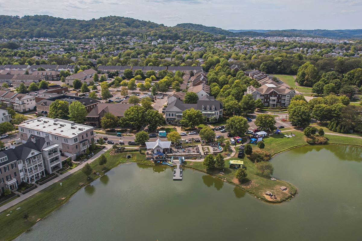 Best for families who want a true walkable neighborhood with an on-site elementary school, resort pools, and a Main Street feel, without leaving Franklin.