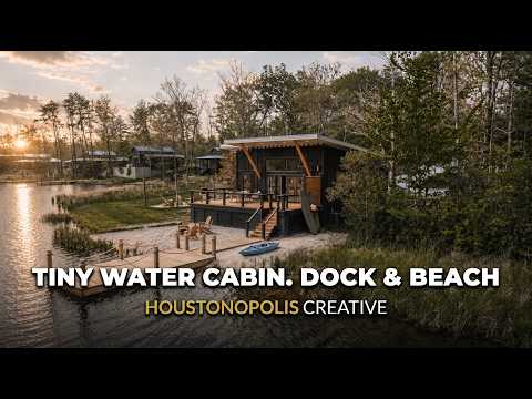 Waterfront tiny home with private dock, sandy beach, and outdoor entertaining space in Tennessee.