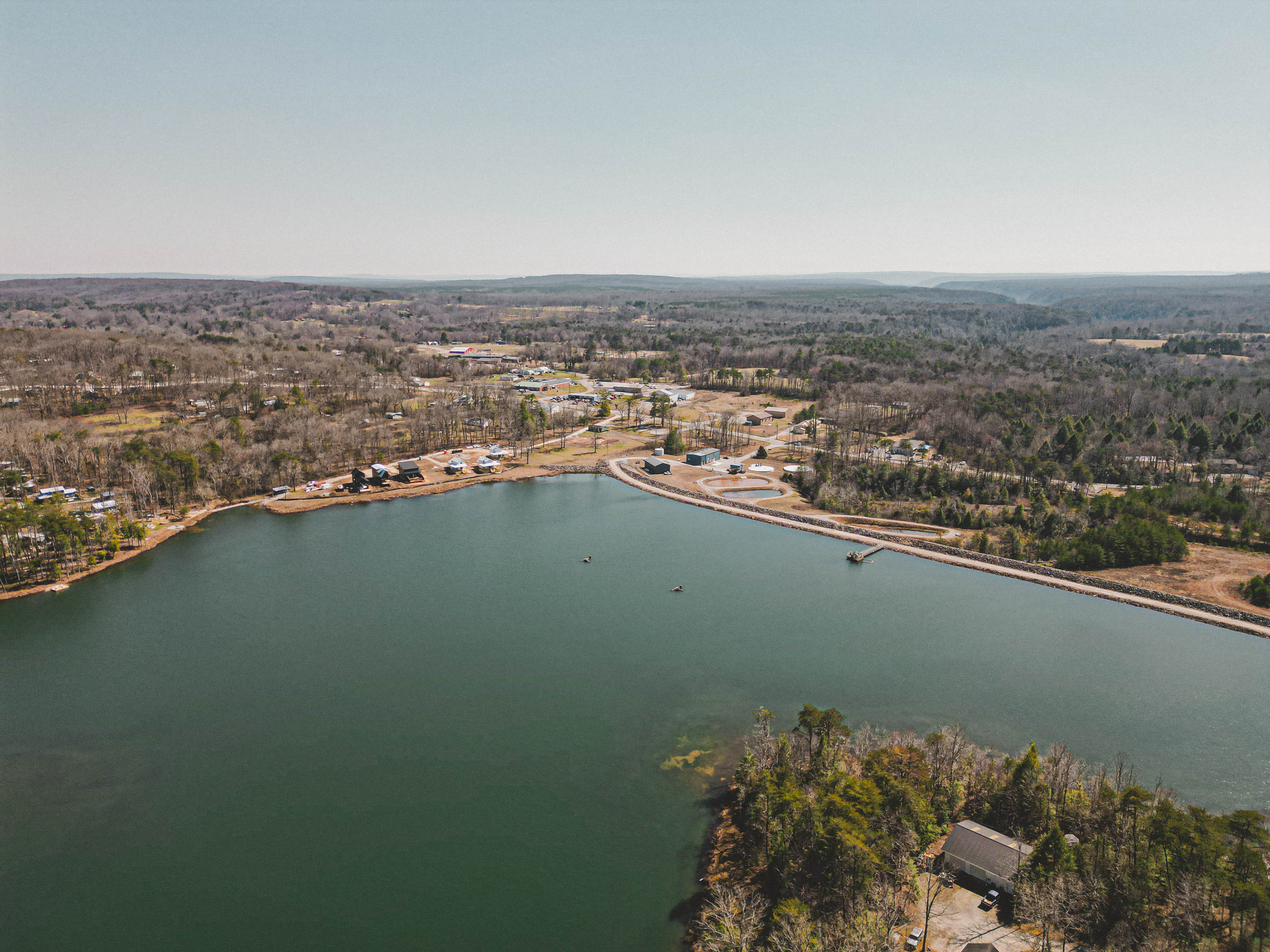 Aerial view of the wooded terrain surrounding Lot 85, The Retreat at Water's Edge.