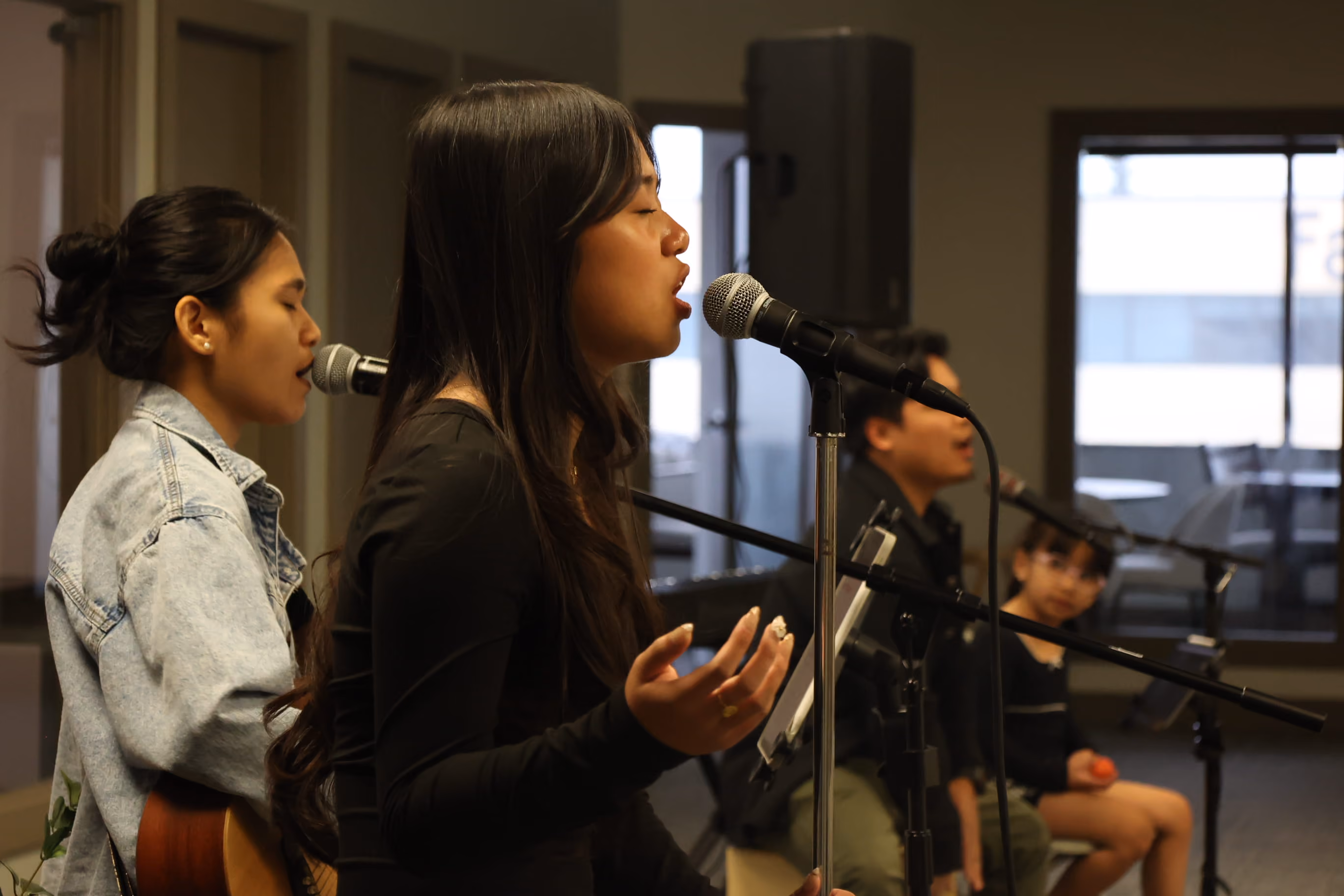 A close up side photo of the worship team at ReSoul Church Edmonton
