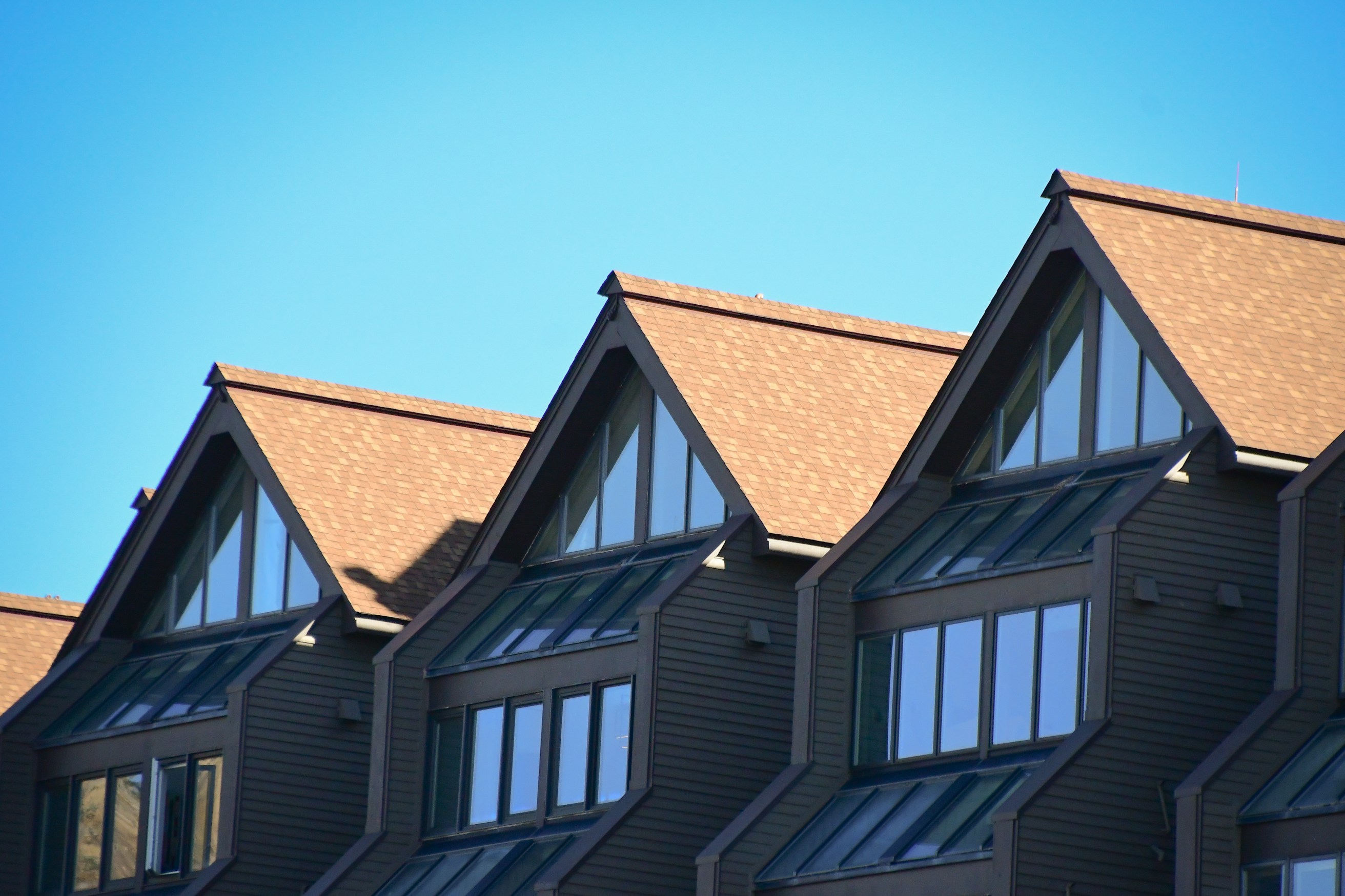Roofline of homes restored by Gustafson Roofing