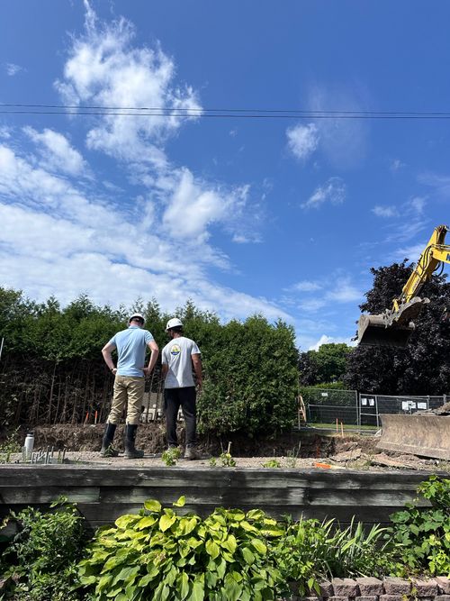 Veinard Developments team reviewing an active excavation site in Ottawa