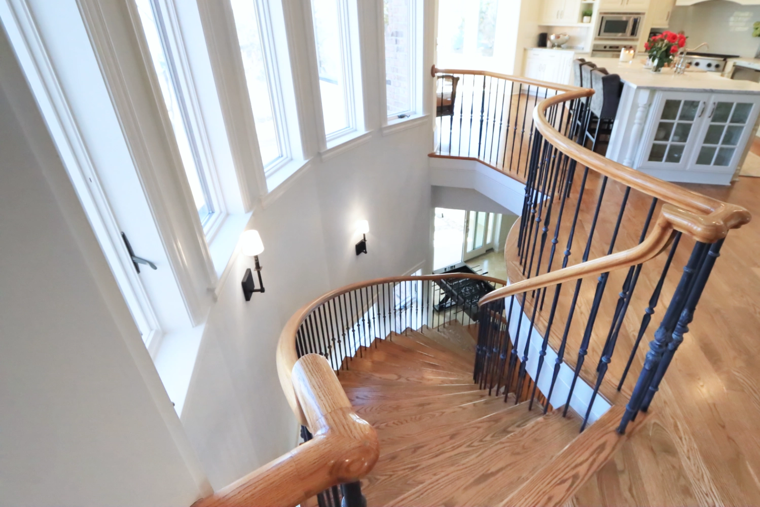 Winding staircase with pendant lighting