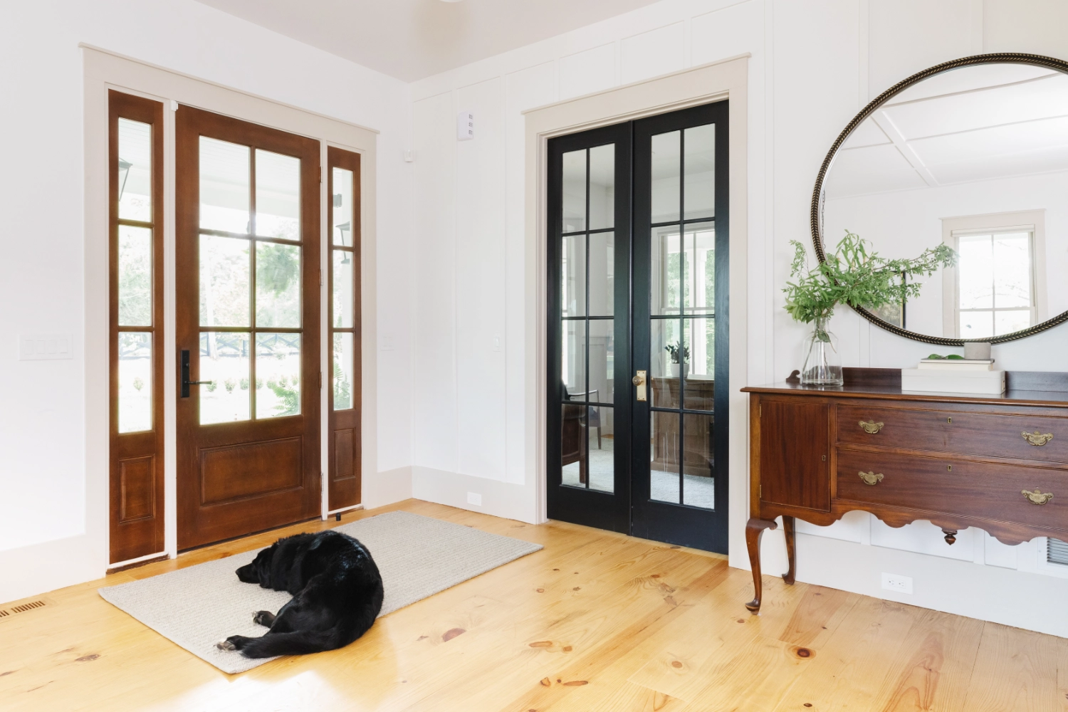 Custom farmhouse front door and 9 foot doors