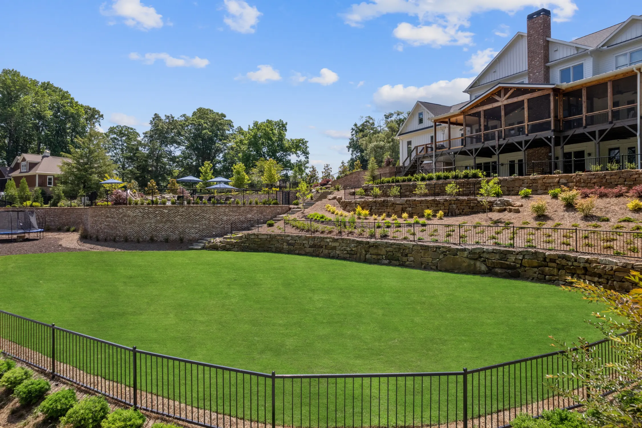 Custom farmhouse outdoor living space