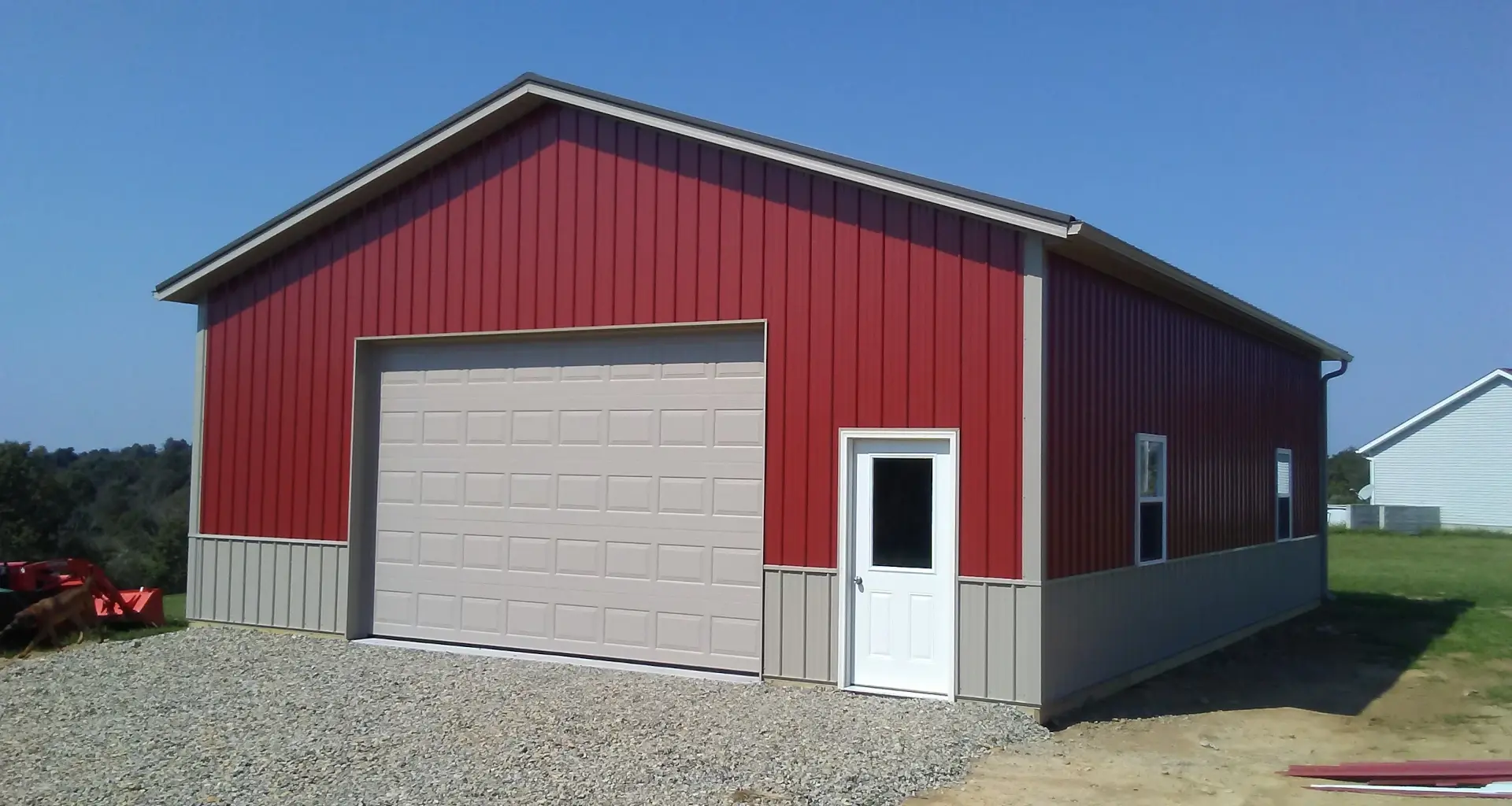 red garage with metal siding