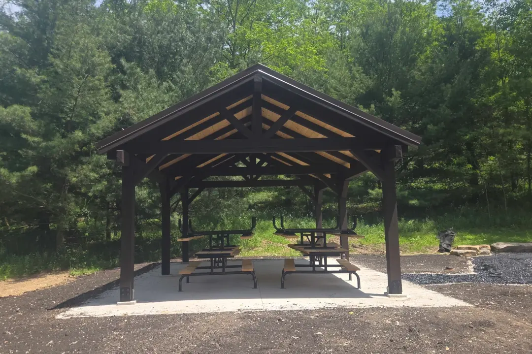 outdoor pavilion with tables underneath