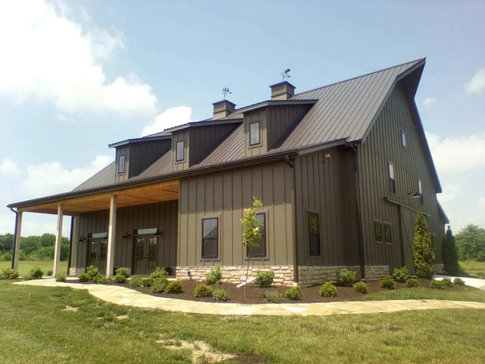 residential project building two story with large side sliding barn door