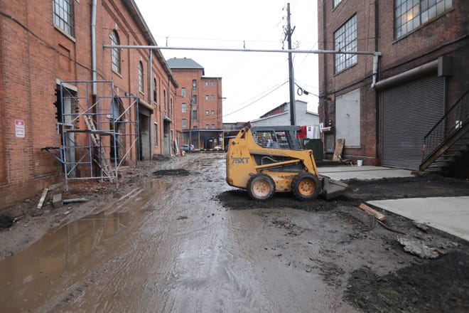 A man works on a building at Botany Mills, located at 90 Dayton Ave. in Passaic. Tuesday December 10, 2019