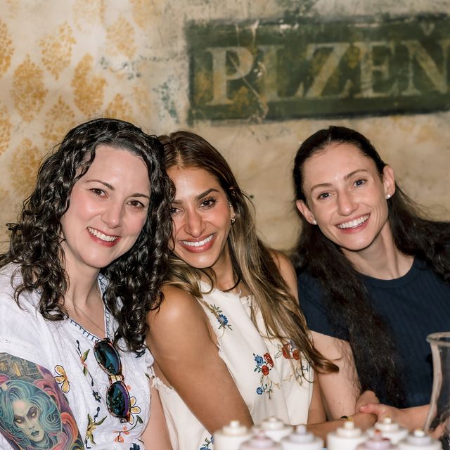Three teammates at a team dinner