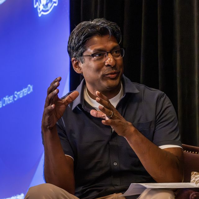 A teammate speaking during a SmarterDx fireside session