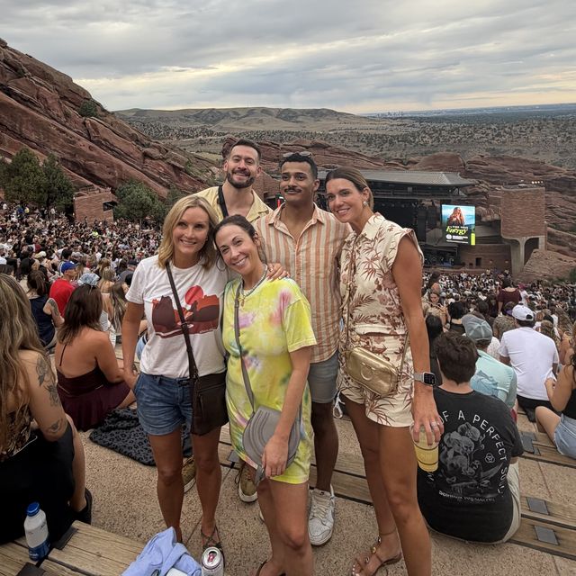 Teammates together on the steps at Red Rocks