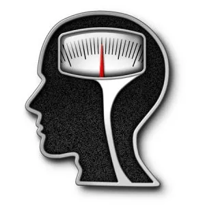 Silhouette de tête avec un pèse-personne à la place du cerveau