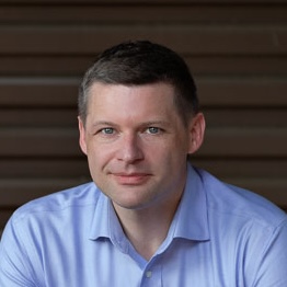 Headshot of Christopher J Cost