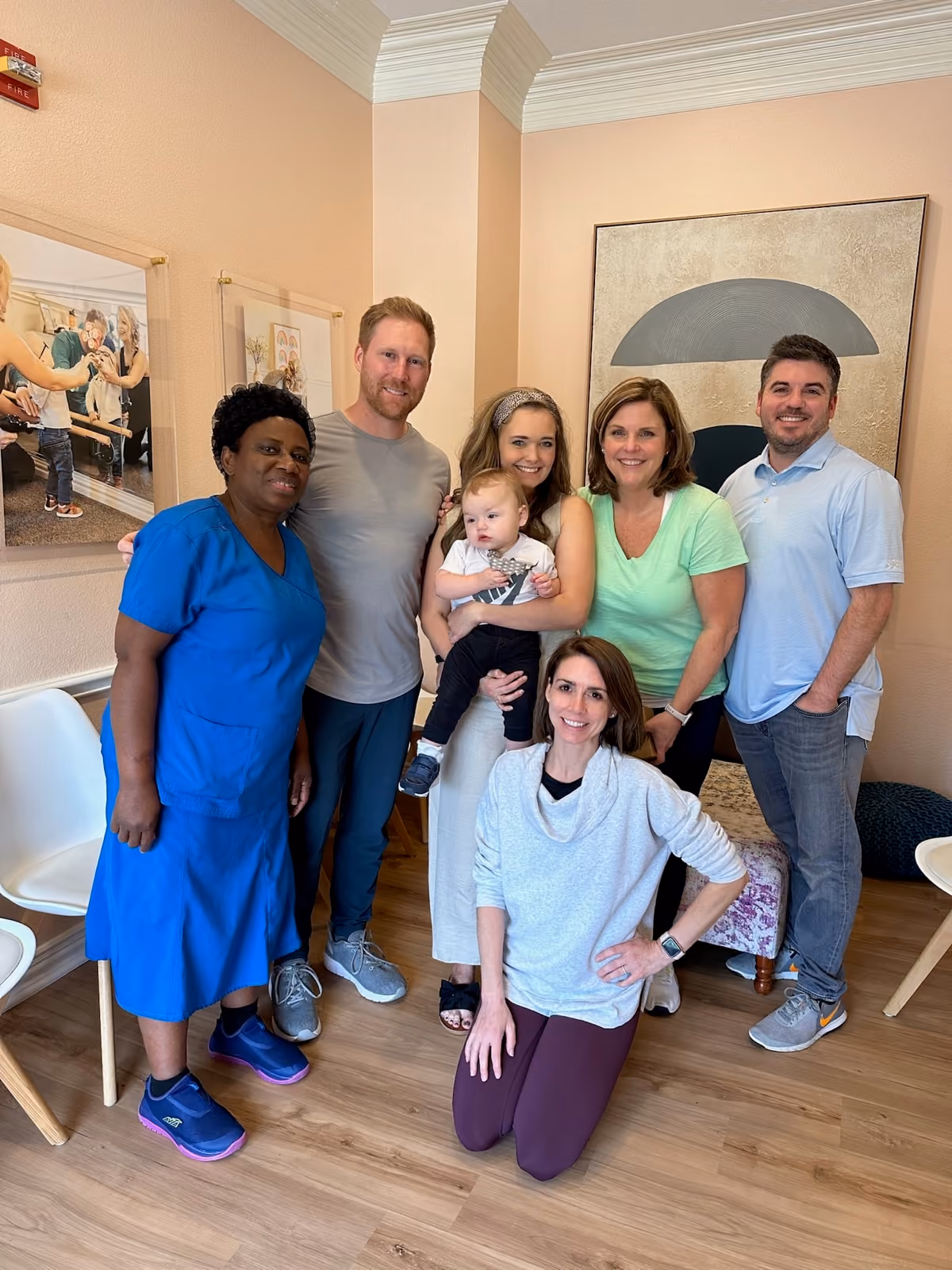 The KinActive Health team together in the clinic waiting room