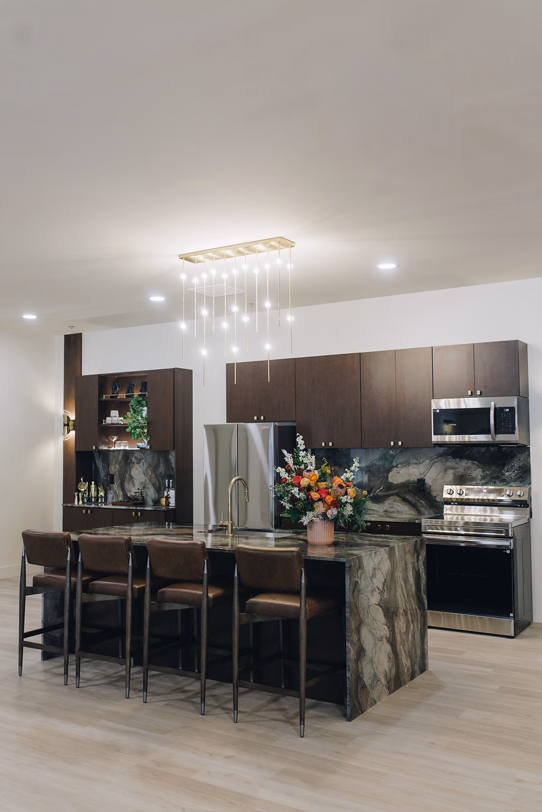Leasing office lounge with dark accents and modern furniture