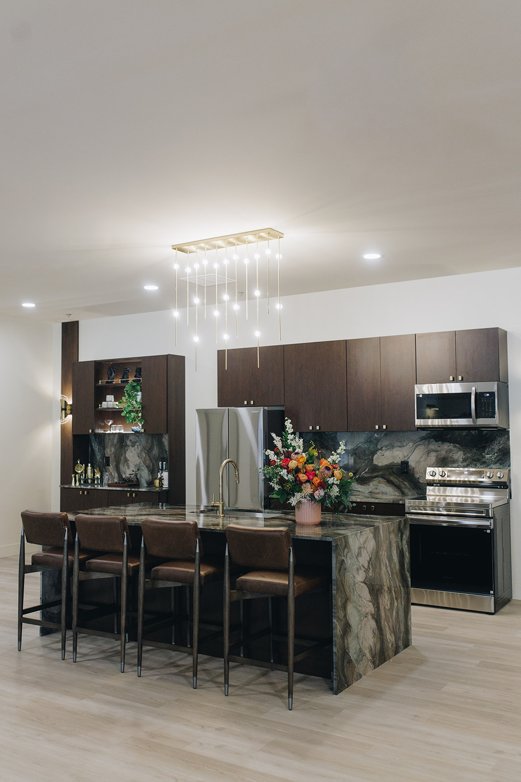 Leasing office lounge with dark accents and modern furniture