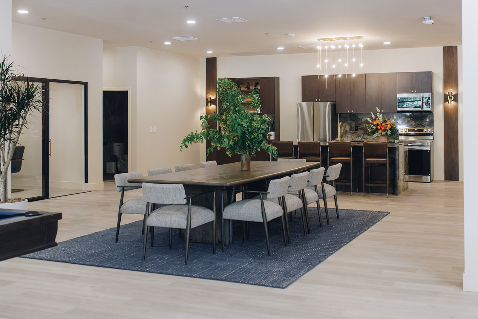 Leasing office lounge with dark accents and modern furniture