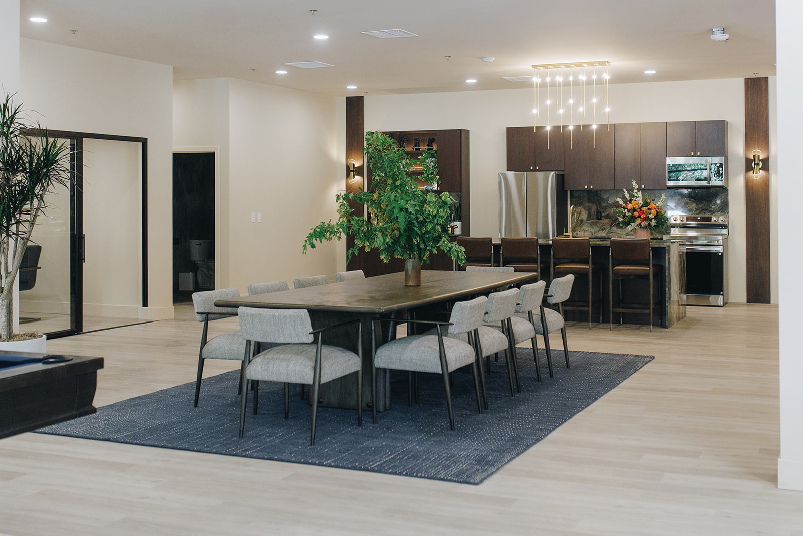 Leasing office lounge with dark accents and modern furniture