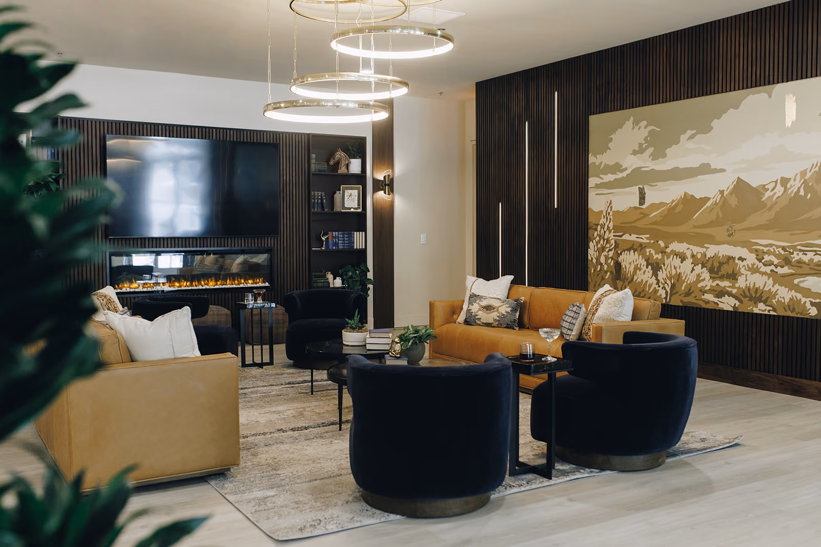 Leasing office lounge with dark accents and modern furniture