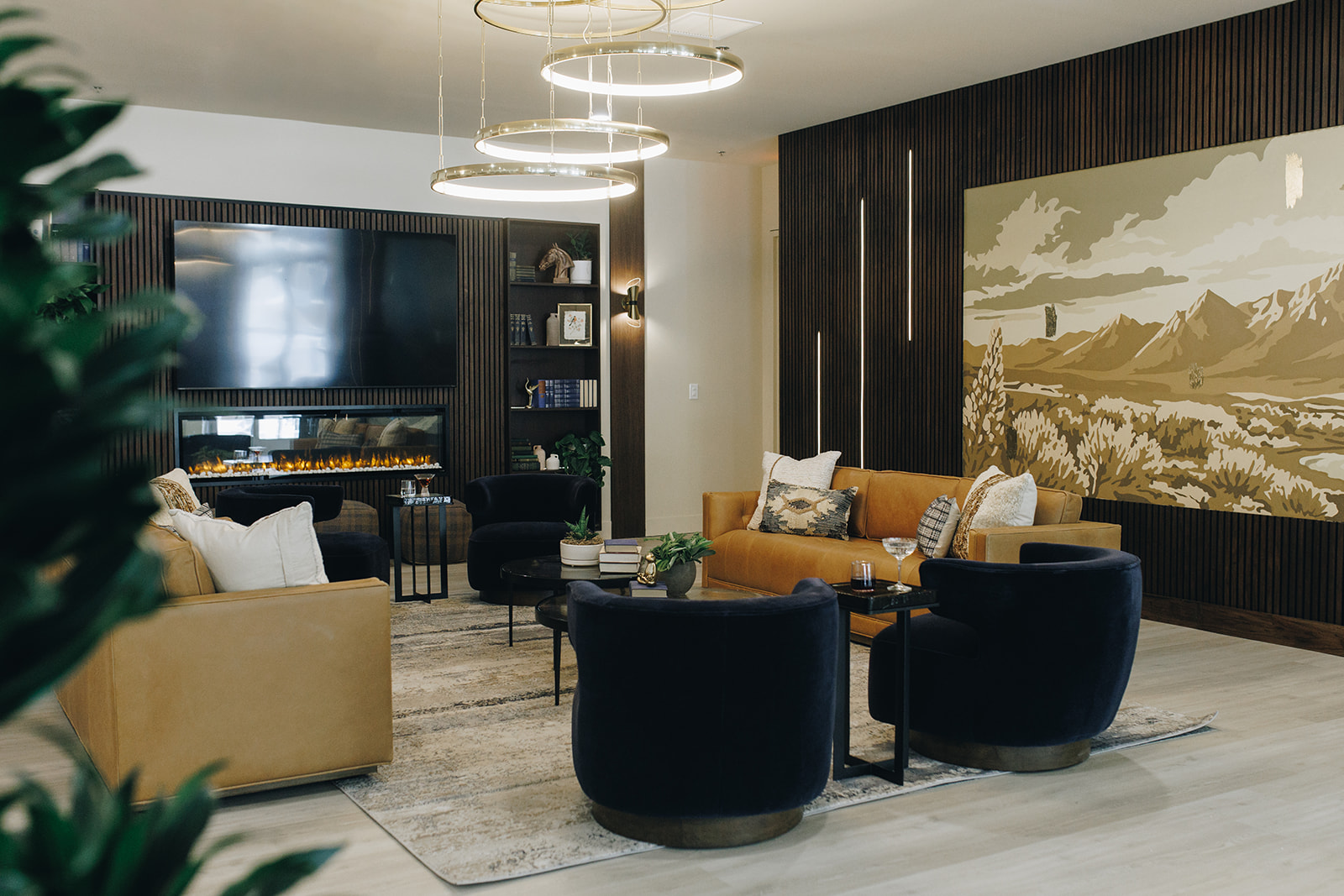 Leasing office lounge with dark accents and modern furniture