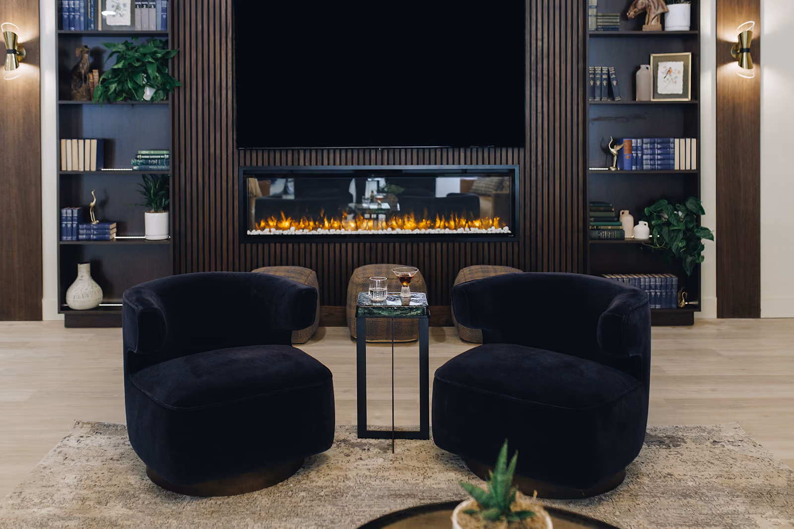 Leasing office lounge with dark accents and modern furniture